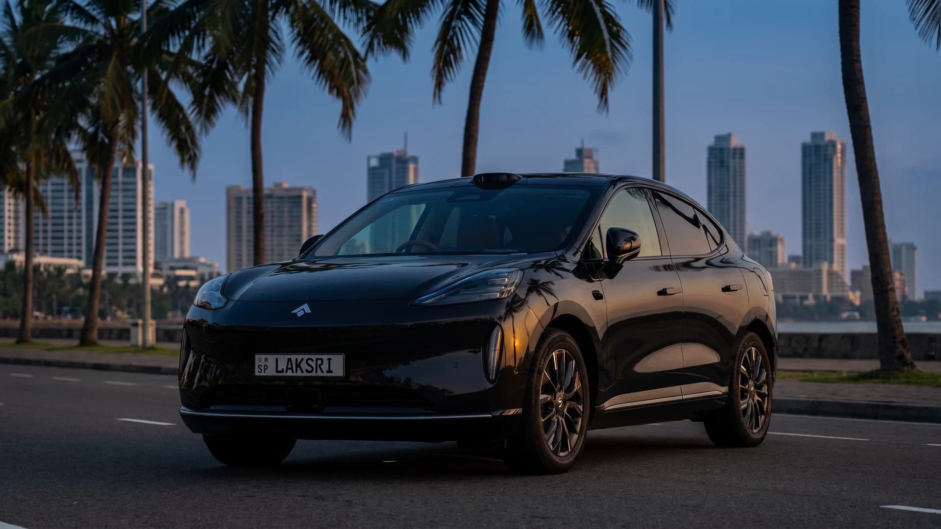 GAC Hyptec HT in a Colombo boulevard at dusk